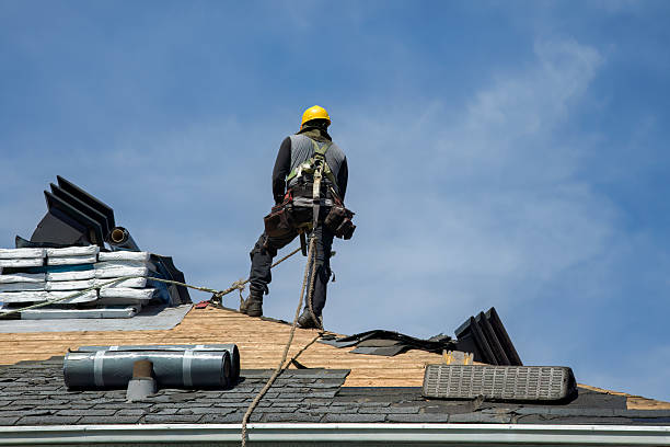 Professional Roof Replacement technician working in Central Point, OR